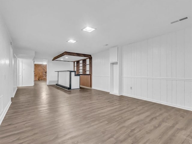15378 E 45th St S, Independence, MO 64055 - unfurnished living room featuring wood finished floors and baseboards