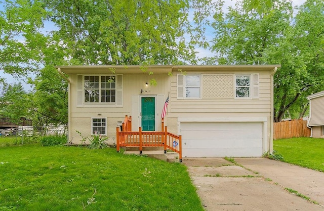 19218 E 6th St N, Independence, MO 64056 - raised ranch with a garage and driveway