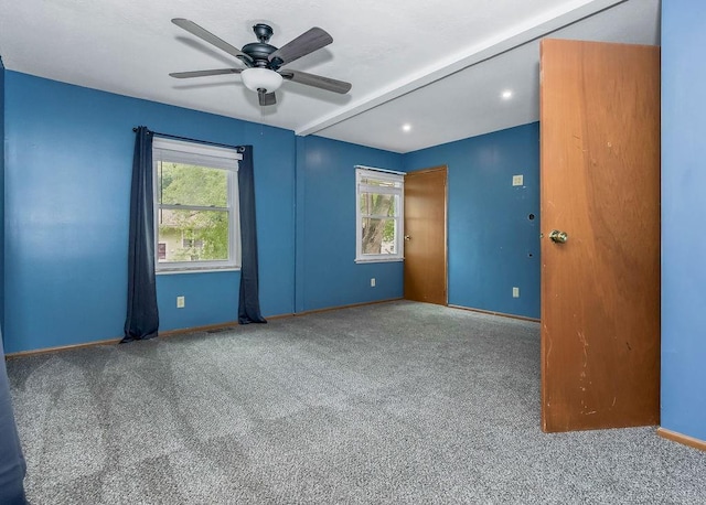 19218 E 6th St N, Independence, MO 64056 - carpeted spare room with a ceiling fan and baseboards