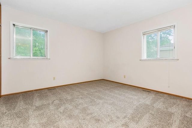 19218 E 6th St N, Independence, MO 64056 - carpeted spare room with baseboards