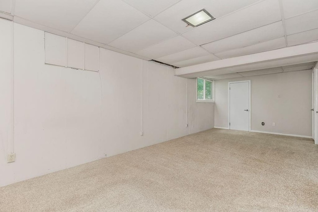 19218 E 6th St N, Independence, MO 64056 - below grade area featuring carpet flooring and a paneled ceiling
