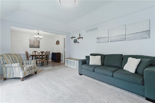 12411 W 100th St, Lenexa, KS 66215 - living room with a chandelier and carpet flooring
