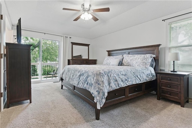 12411 W 100th St, Lenexa, KS 66215 - bedroom featuring light colored carpet, access to outside, and a ceiling fan