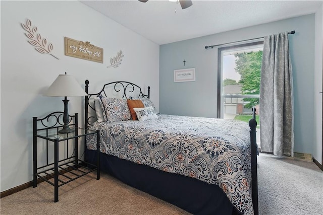 12411 W 100th St, Lenexa, KS 66215 - carpeted bedroom with ceiling fan and baseboards