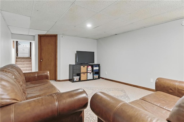 12411 W 100th St, Lenexa, KS 66215 - living area featuring carpet floors, stairs, and a paneled ceiling