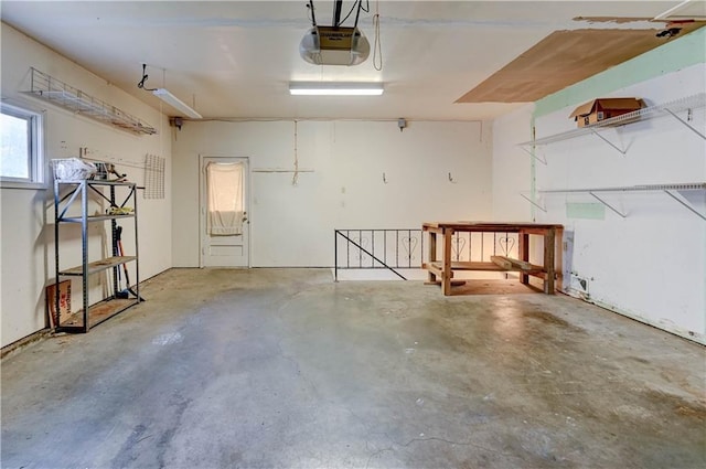 7907 Elm Ave, Raytown, MO 64138 - garage featuring a garage door opener