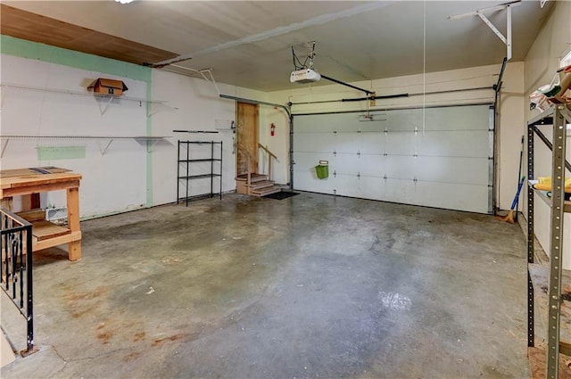 7907 Elm Ave, Raytown, MO 64138 - garage featuring a garage door opener