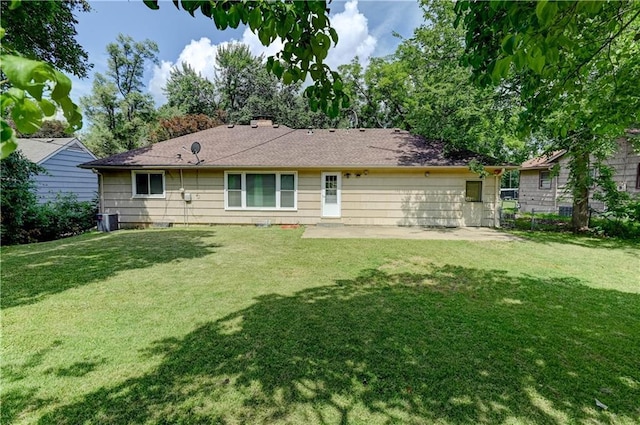 7907 Elm Ave, Raytown, MO 64138 - rear view of house featuring a patio area