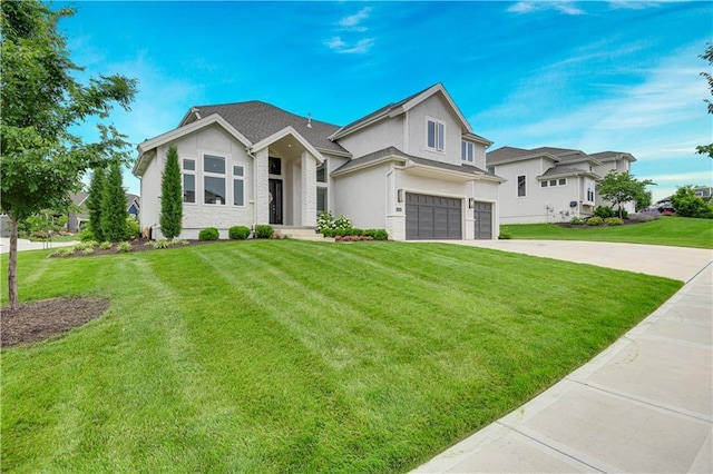 15601 Catalina St, Overland Park, KS 66224 - view of front facade featuring a garage, stucco siding, a front lawn, and concrete driveway