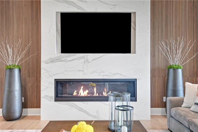 15601 Catalina St, Overland Park, KS 66224 - detailed view of a high end fireplace and wood finished floors