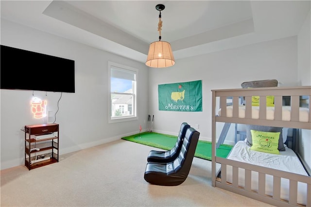 15601 Catalina St, Overland Park, KS 66224 - carpeted bedroom featuring a tray ceiling and baseboards