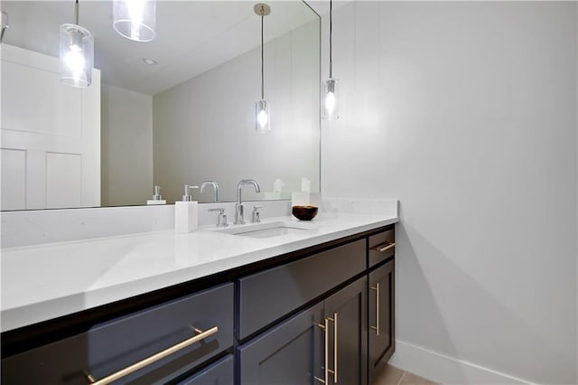 15601 Catalina St, Overland Park, KS 66224 - bathroom featuring vanity, baseboards, and tile patterned flooring