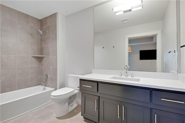 15601 Catalina St, Overland Park, KS 66224 - bathroom with toilet, vanity, bathing tub / shower combination, and tile patterned floors