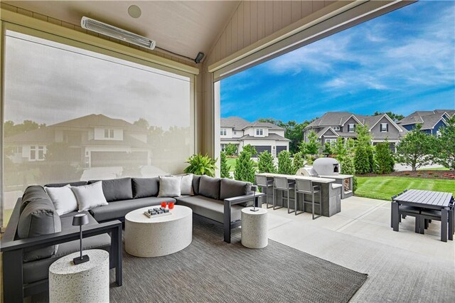 15601 Catalina St, Overland Park, KS 66224 - view of patio / terrace with an outdoor hangout area, an outdoor kitchen, a residential view, and outdoor dining area