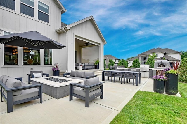 15601 Catalina St, Overland Park, KS 66224 - view of patio / terrace with an outdoor living space with a fire pit