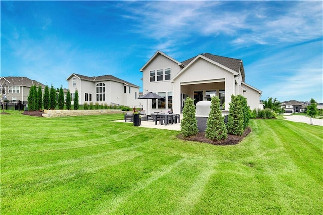 15601 Catalina St, Overland Park, KS 66224 - back of property featuring a patio and a yard