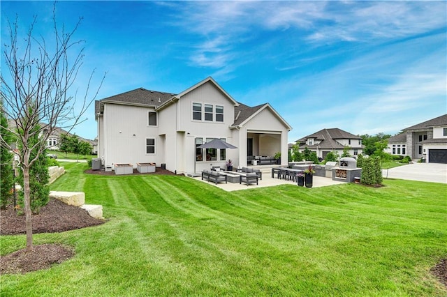 15601 Catalina St, Overland Park, KS 66224 - back of house featuring outdoor lounge area, a yard, a patio, and central AC unit