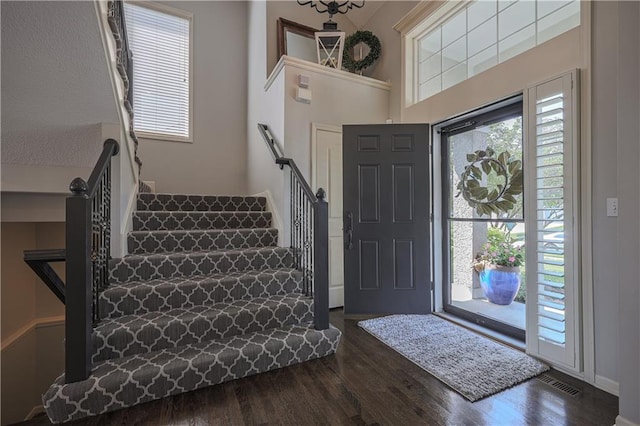 23856 W 124th Ct, Olathe, KS 66061 - foyer with stairway and dark wood finished floors