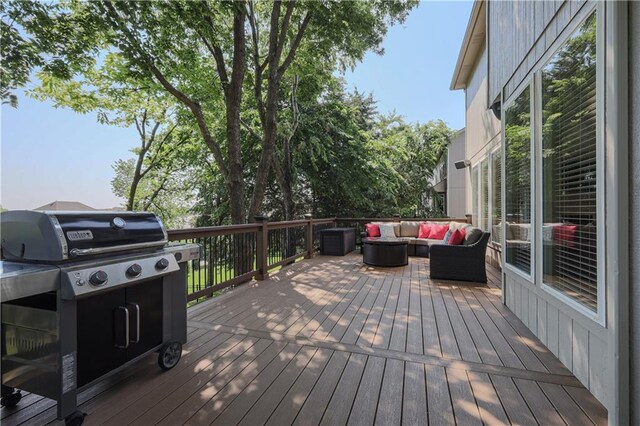 23856 W 124th Ct, Olathe, KS 66061 - wooden terrace featuring a grill and an outdoor living space