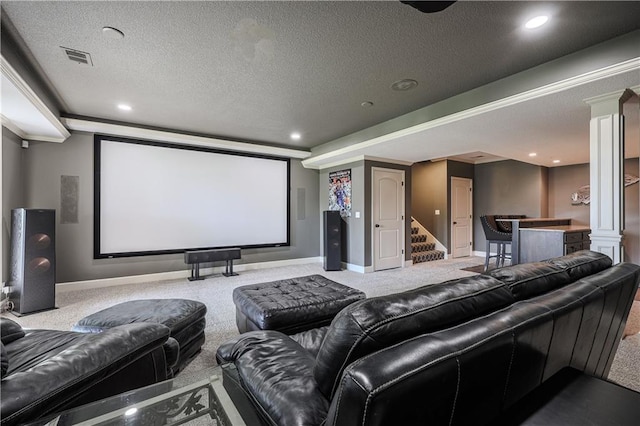 23856 W 124th Ct, Olathe, KS 66061 - home theater featuring decorative columns, carpet flooring, a textured ceiling, bar area, and recessed lighting