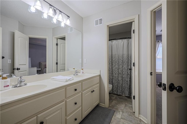 23856 W 124th Ct, Olathe, KS 66061 - full bath featuring double vanity and stone finish floors