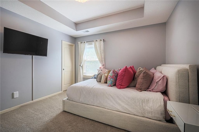 23856 W 124th Ct, Olathe, KS 66061 - carpeted bedroom featuring baseboards and a tray ceiling