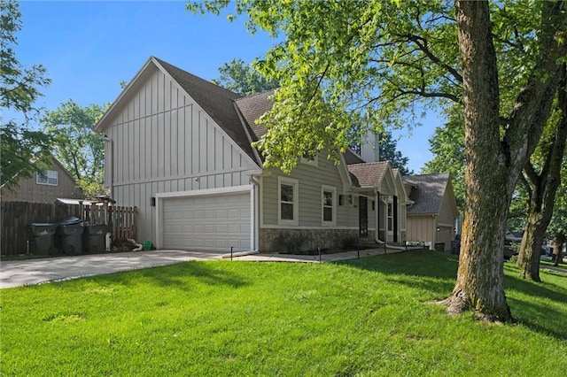 12001 S Hagan St, Olathe, KS 66062 - view of front of house with board and batten siding, a garage, a shingled roof, concrete driveway, and stone siding