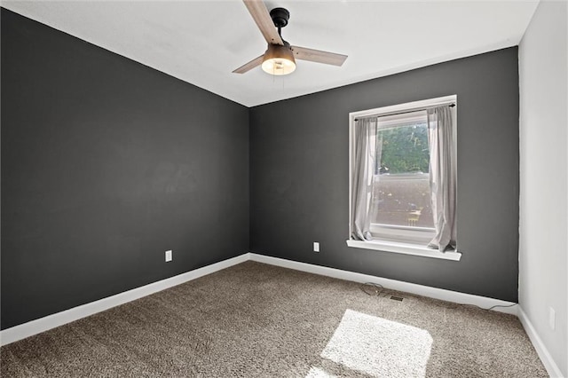 12001 S Hagan St, Olathe, KS 66062 - spare room featuring ceiling fan, carpet, and baseboards