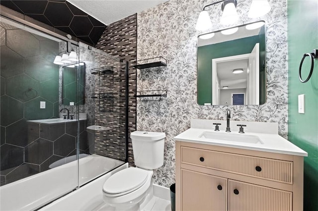 12001 S Hagan St, Olathe, KS 66062 - full bathroom with wallpapered walls, vanity, toilet, and bath / shower combo with glass door