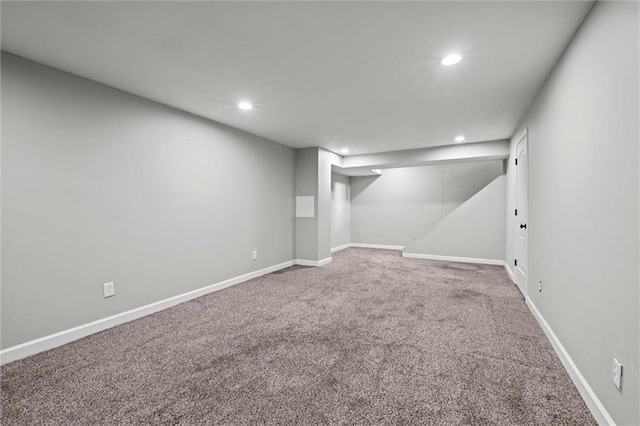 12001 S Hagan St, Olathe, KS 66062 - finished below grade area featuring carpet floors, recessed lighting, and baseboards