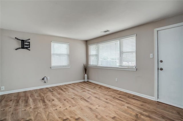 6005 NE 50th St, Kansas City, MO 64119 - unfurnished room with wood finished floors and baseboards