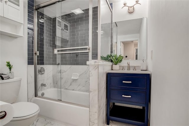 6005 NE 50th St, Kansas City, MO 64119 - bathroom with marble look tiles, enclosed tub / shower combo, and vanity