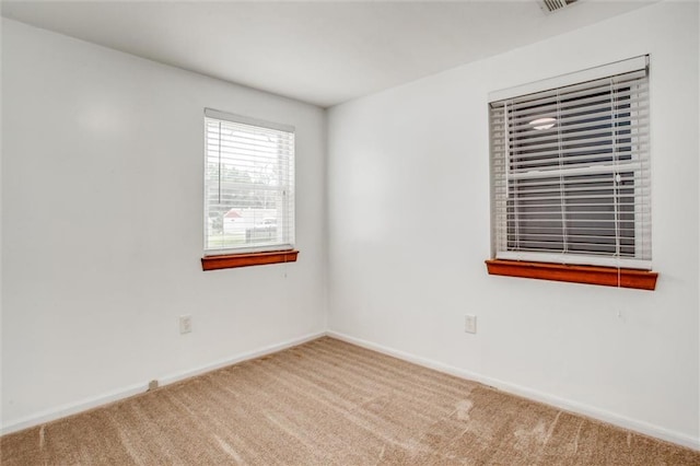 6005 NE 50th St, Kansas City, MO 64119 - spare room with carpet floors