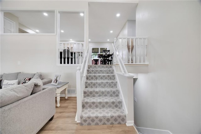 513 Forestglen Ln, Lansing, KS 66043 - stairway featuring wood finished floors and recessed lighting