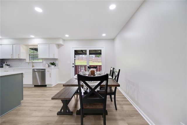 513 Forestglen Ln, Lansing, KS 66043 - dining room featuring light wood-style flooring and recessed lighting