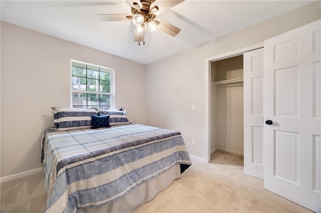 513 Forestglen Ln, Lansing, KS 66043 - bedroom featuring light carpet, a closet, and a ceiling fan