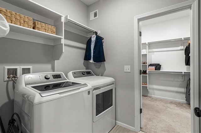 1517 SW Arbor Creek Dr, Lees Summit, MO 64082 - washroom with independent washer and dryer, carpet floors, and baseboards
