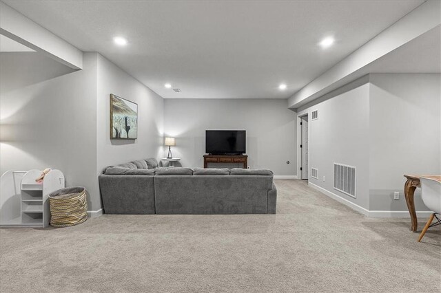 1517 SW Arbor Creek Dr, Lees Summit, MO 64082 - living area featuring light colored carpet, recessed lighting, and baseboards