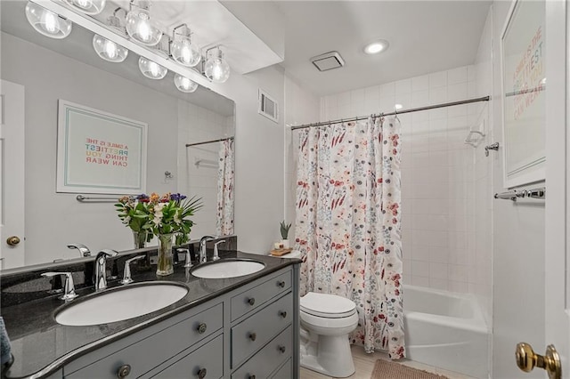 2204 W 123rd Ter, Leawood, KS 66209 - full bath with double vanity, toilet, and shower / tub combo with curtain