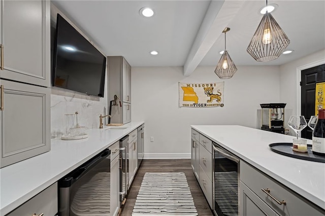 2204 W 123rd Ter, Leawood, KS 66209 - kitchen with wine cooler, gray cabinetry, baseboards, dark wood-style floors, and light countertops