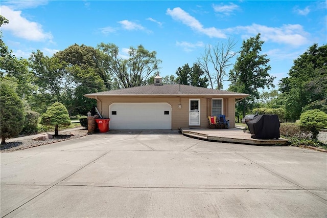 3814 S Outer Belt Rd, Oak Grove, MO 64075 - view of front of house with a garage and concrete driveway