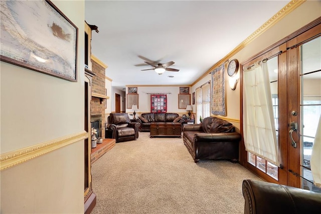 3814 S Outer Belt Rd, Oak Grove, MO 64075 - living room featuring carpet floors, ceiling fan, crown molding, and a brick fireplace