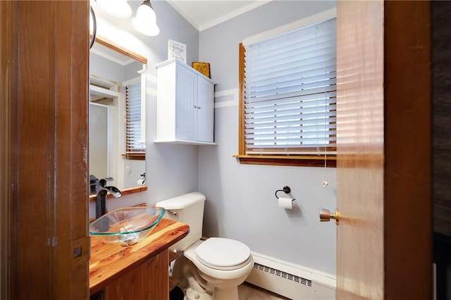3814 S Outer Belt Rd, Oak Grove, MO 64075 - bathroom featuring a baseboard heating unit, a shower with door, vanity, and ornamental molding