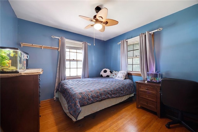 3814 S Outer Belt Rd, Oak Grove, MO 64075 - bedroom featuring wood-type flooring and ceiling fan