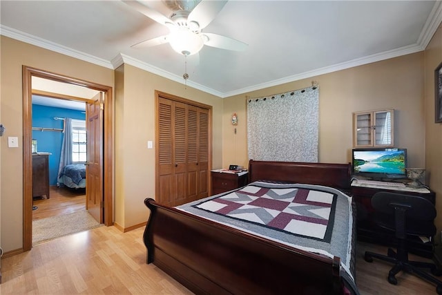 3814 S Outer Belt Rd, Oak Grove, MO 64075 - bedroom with light wood finished floors, a closet, a desk, ornamental molding, and ceiling fan