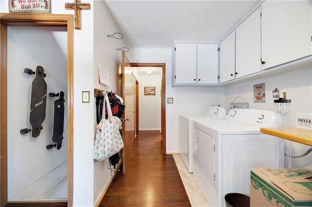3814 S Outer Belt Rd, Oak Grove, MO 64075 - laundry room featuring cabinet space, washing machine and dryer, and hardwood / wood-style floors