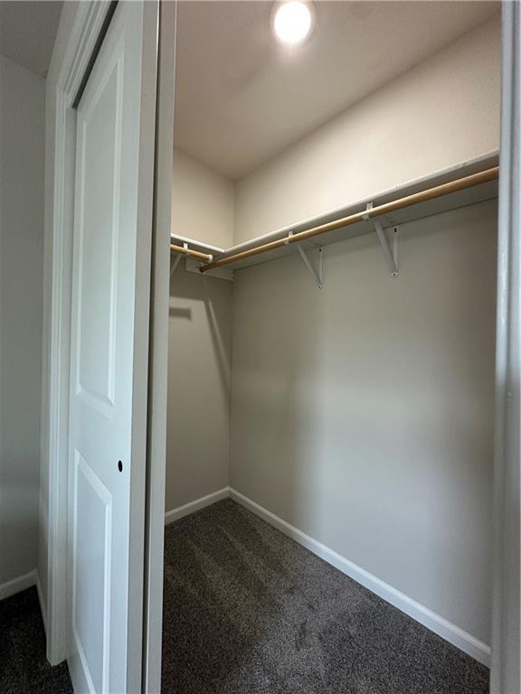 904 N 9th St, Neodesha, KS 66757 - spacious closet with dark carpet