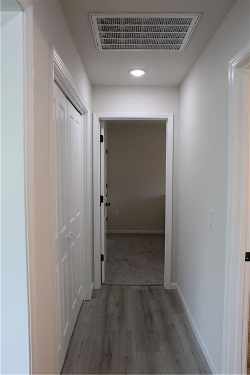 904 N 9th St, Neodesha, KS 66757 - hallway with wood finished floors and recessed lighting