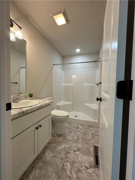 904 N 9th St, Neodesha, KS 66757 - full bath with vanity, marble finish floors, and a shower