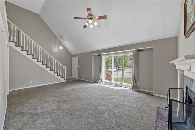 701 NE Hunters Cir, Blue Springs, MO 64014 - unfurnished living room with stairs, a fireplace, a ceiling fan, carpet flooring, and high vaulted ceiling